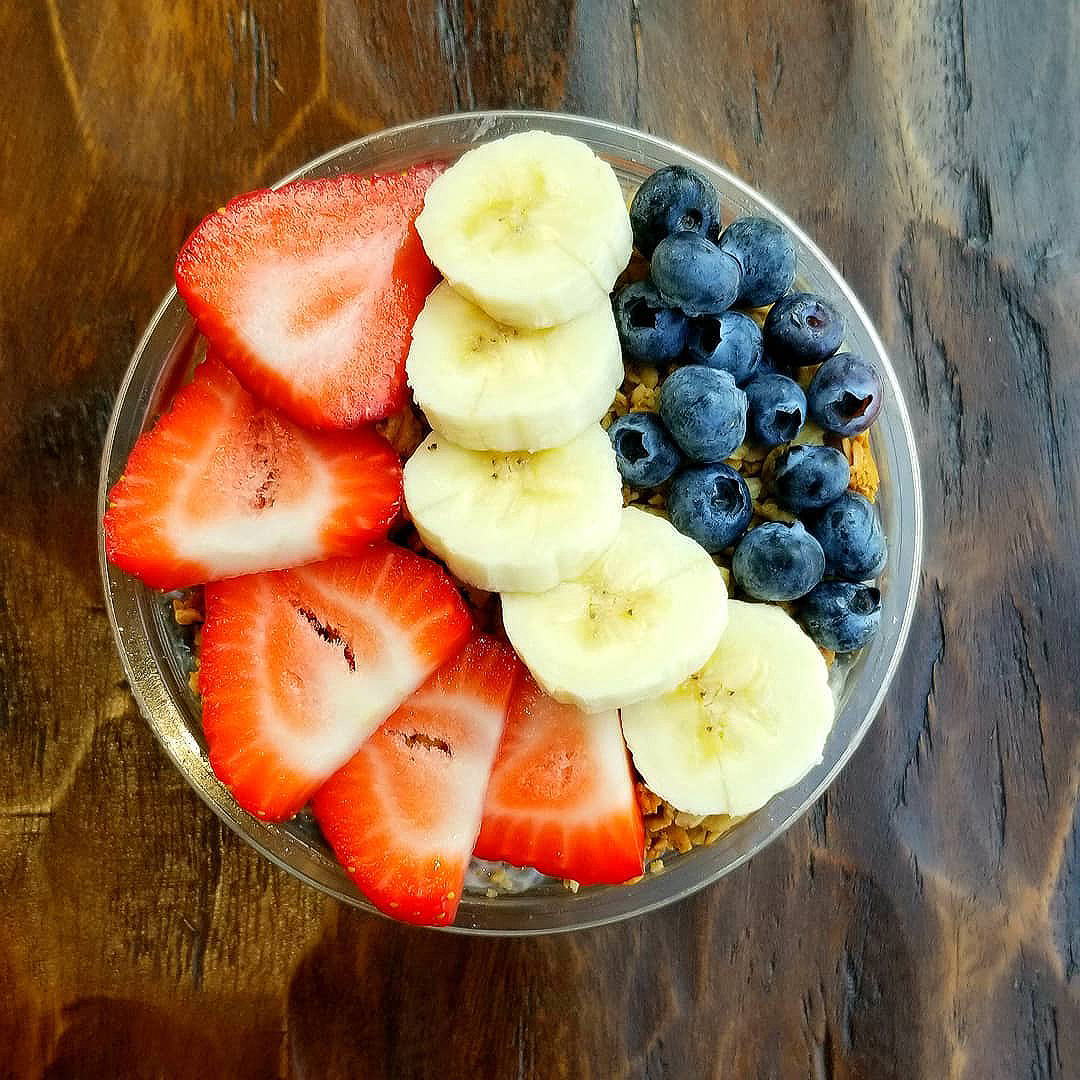 acai bowl with strawberry, banana and berries